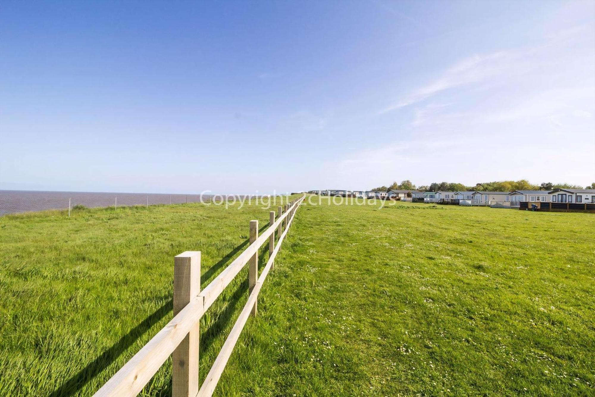 Beautiful Caravan With Decking And Wifi At Broadland Sands Ref 20382bs Camping *